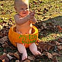 baby, pumpkin, autumn, leaves, outdoor, clapping, smiling, child, grass, sunlight, fall, diaper, nature, seasonal, celebration, holiday, cute, happy, sitting, fun