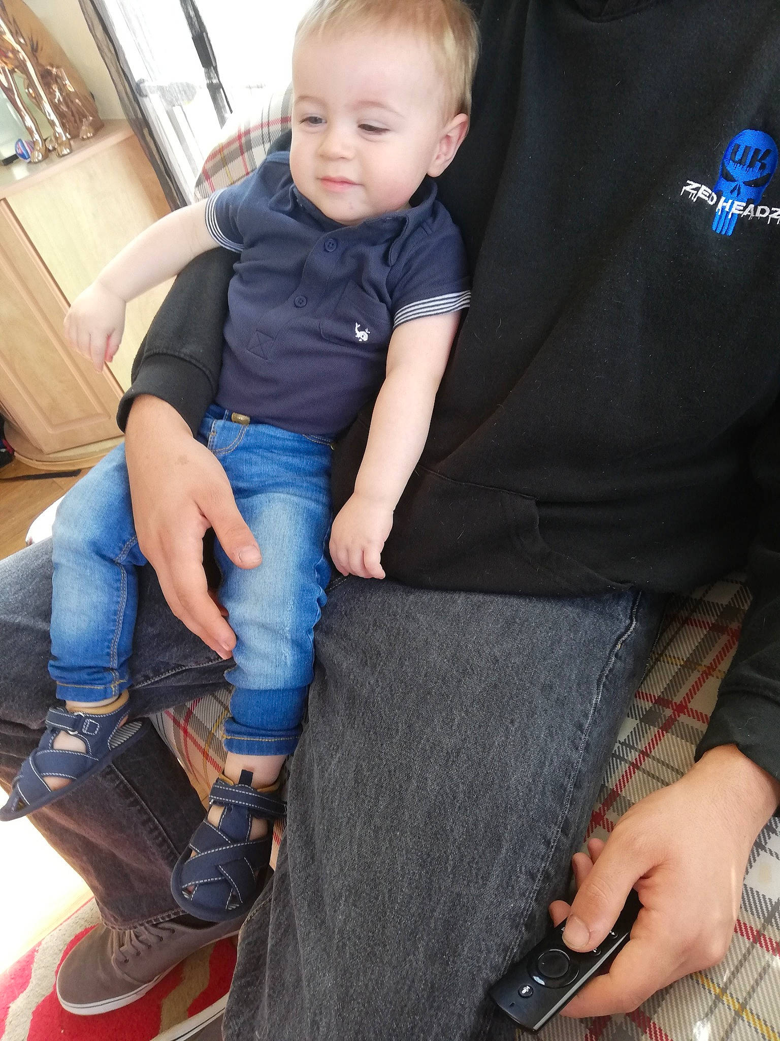 Jackson is registered to the contest to win money with this photo: baby, child, child_model, denim, footwear, jeans, leg, male, person, shoe, sitting, skin, t_shirt, textile, toddler