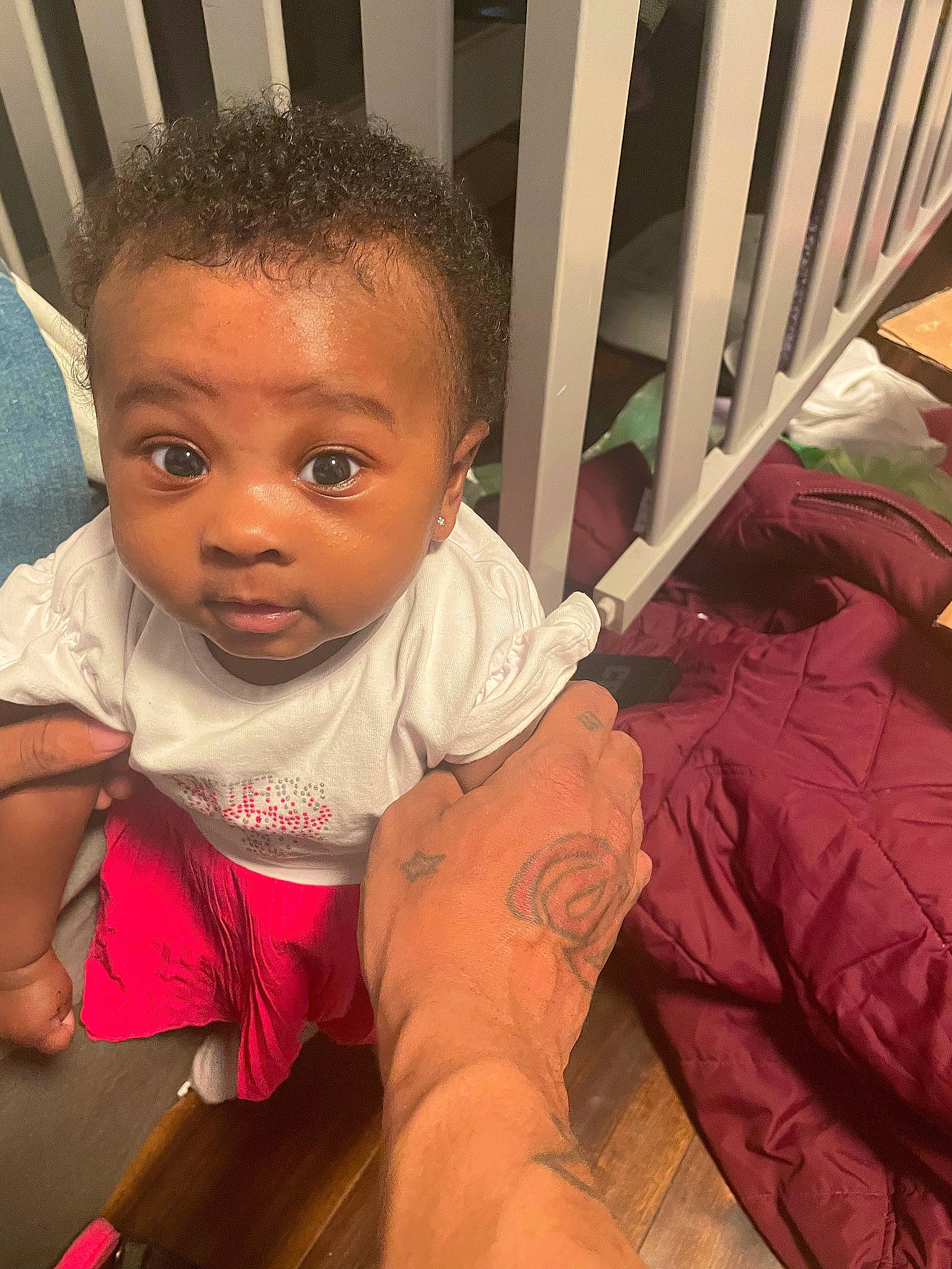 Meilani joined the competition — help win amazing prizes! baby, baby_toddler_clothing, barefoot, cheek, comfort, eye, flooring, foot, fun, happy, human_leg, leg, nose, organ, person, room, sitting, skin, sock, toddler