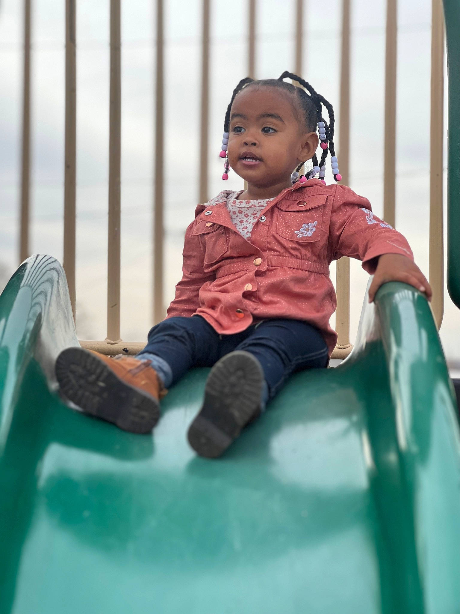Cauri joined the competition — help win amazing prizes! baby, baby_toddler_clothing, child, city, facial_expression, fun, happy, human_settlement, leisure, magenta, outdoor_play_equipment, person, play, playground_slide, public_space, recreation, sitting, skin, toddler, vacation