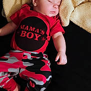 Axl joined the competition — help win amazing prizes! apparel, baby, blanket, camo_pants, casual, child, closeup, cozy, cute, human, indoors, infant, one_person, peaceful, portrait, red_shirt, resting, sleeping, soft_texture, toddler