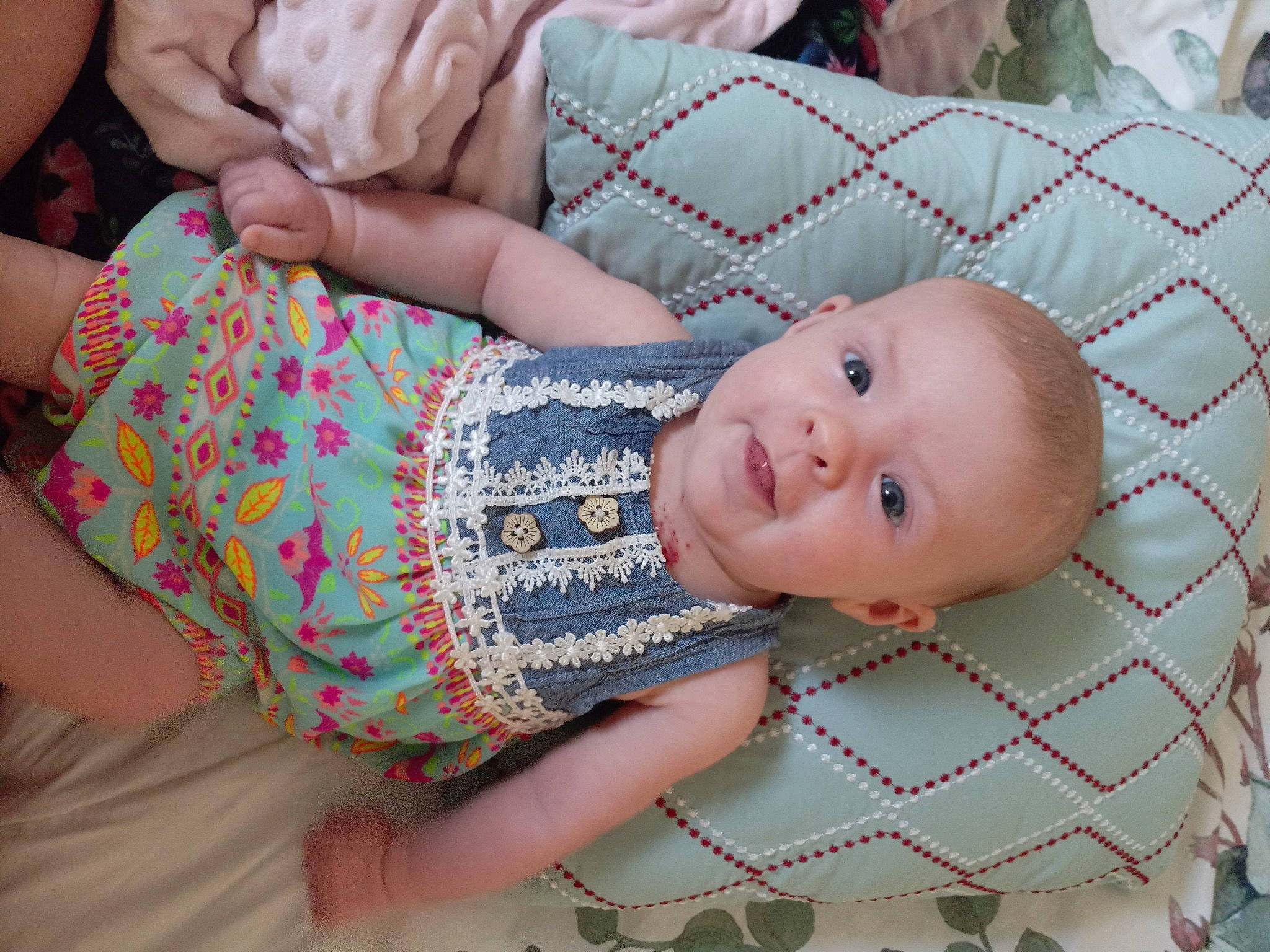 Juliana joined the competition — help win amazing prizes! arm, baby, baby_products, baby_toddler_clothing, cheek, child, comfort, finger, grass, happy, human_leg, linens, nail, pattern, person, pink, sitting, skin, textile, thigh