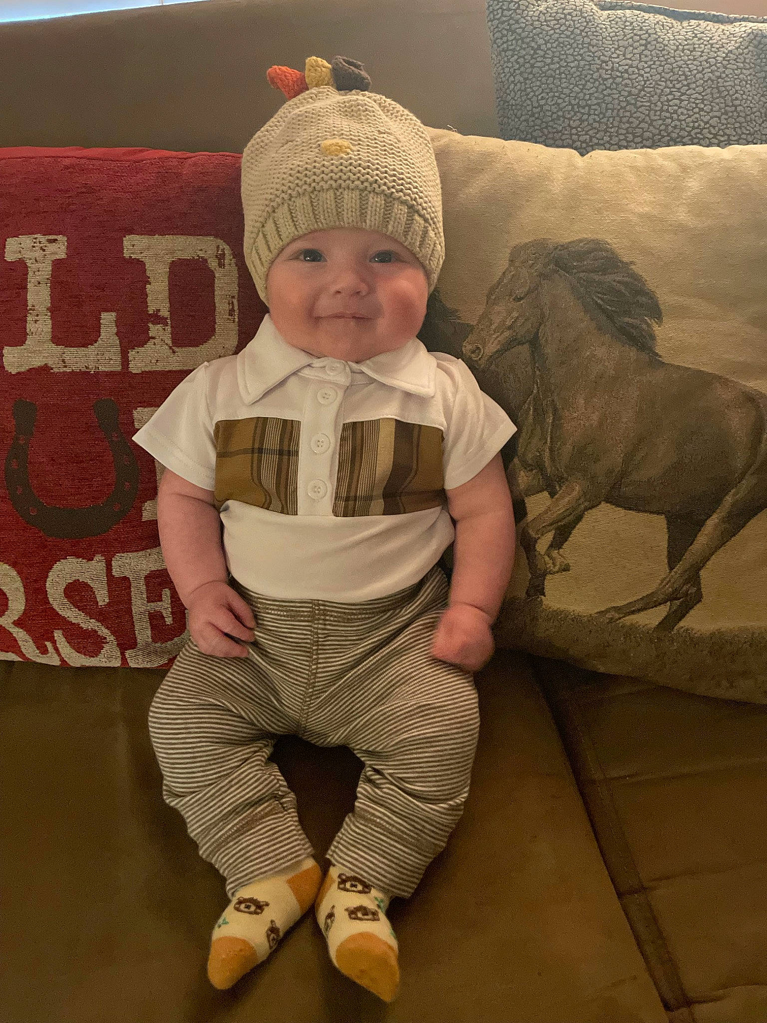 Raymond joined the competition — help win amazing prizes! art, baby, baby_toddler_clothing, cap, child, comfort, flooring, fun, happy, headgear, headwear, joy, landscape, linens, pattern, person, sitting, sleeve, smile, t_shirt