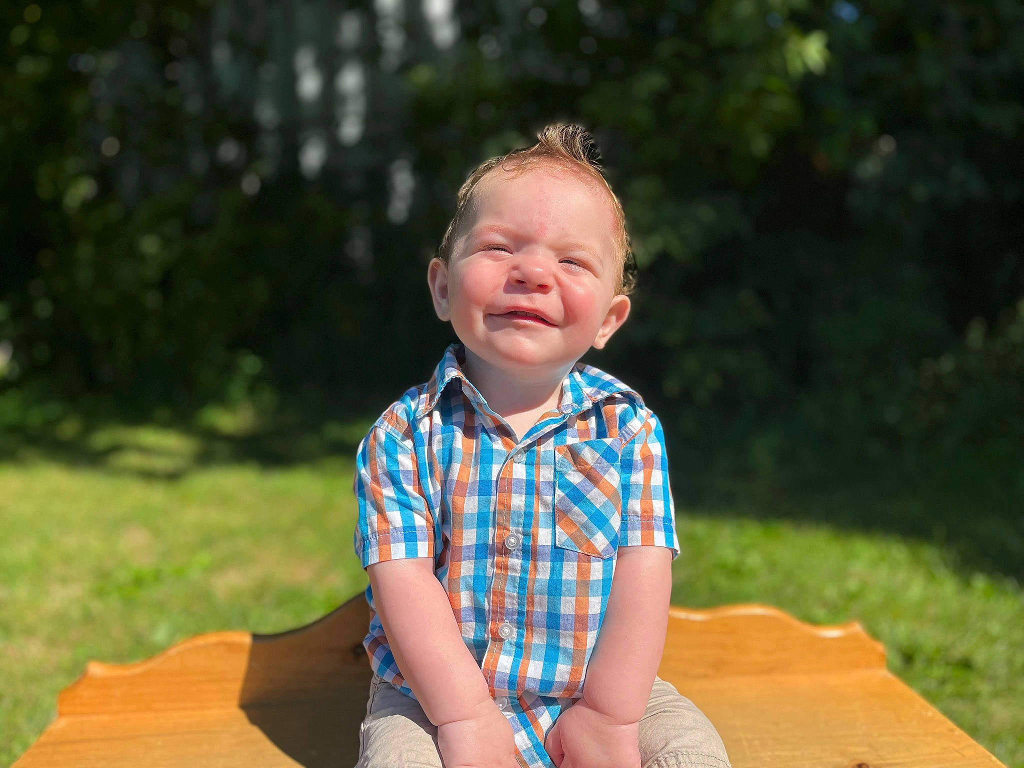 Kooper is registered to the contest to win money with this photo: baby, baby_toddler_clothing, child, electric_blue, face, fun, grass, happy, joy, leisure, pattern, people_in_nature, person, plaid, plant, recreation, shorts, sleeve, t_shirt, tartan