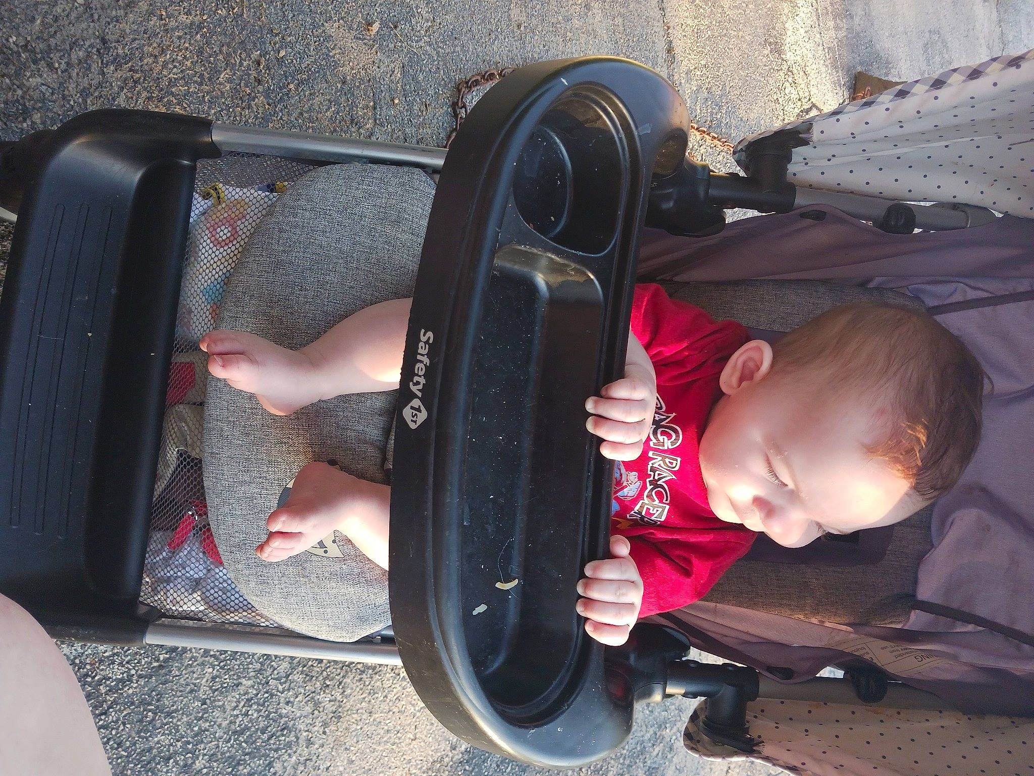 Kooper is registered to the contest to win money with this photo: auto_part, automotive_exterior, automotive_tire, automotive_wheel_system, baby, baby_carriage, baby_products, bumper, comfort, fender, human_leg, motor_vehicle, person, rim, sneakers, tints_and_shades, tire, toddler, vehicle_door, wheel