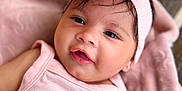 Cataleya joined the competition — help win amazing prizes! baby, child, headband, pink, smile, face, infant, clothing, blanket, cute, portrait, soft_texture, happy, young_child, indoors, closeup, person, apparel, resting, fashion