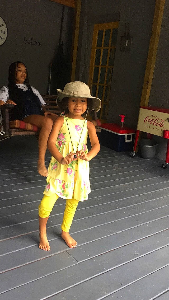 Aminah is registered to the contest to win money with this photo: barefoot, child, fashion_accessory, fun, hat, headgear, headwear, joy, person, toddler, vacation