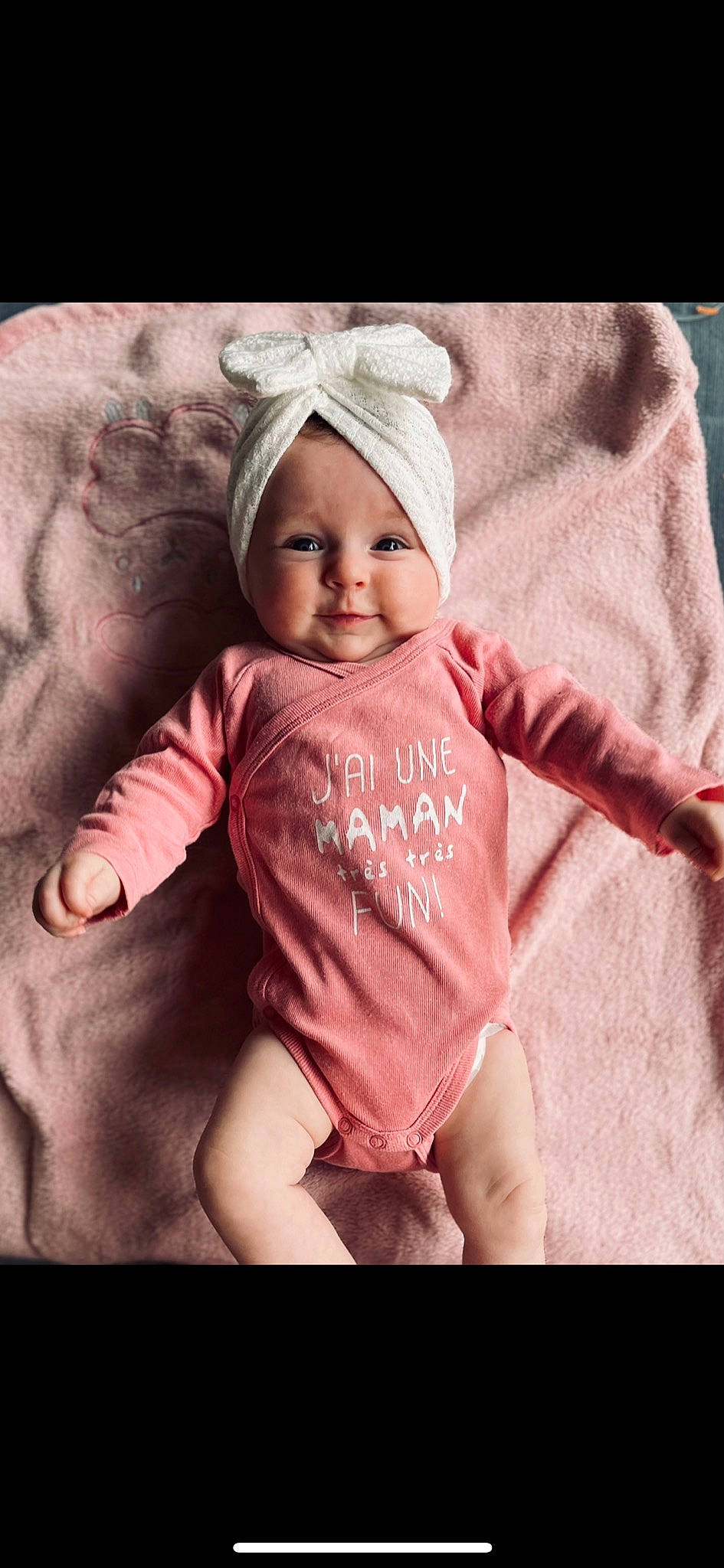 Zoé participe au concours pour gagner de l'argent avec cette photo : baby, baby_toddler_clothing, cap, child, comfort, eye, flash_photography, happy, headwear, human_body, human_leg, lip, mouth, person, photograph, pink, skin, sleeve, smile, t_shirt