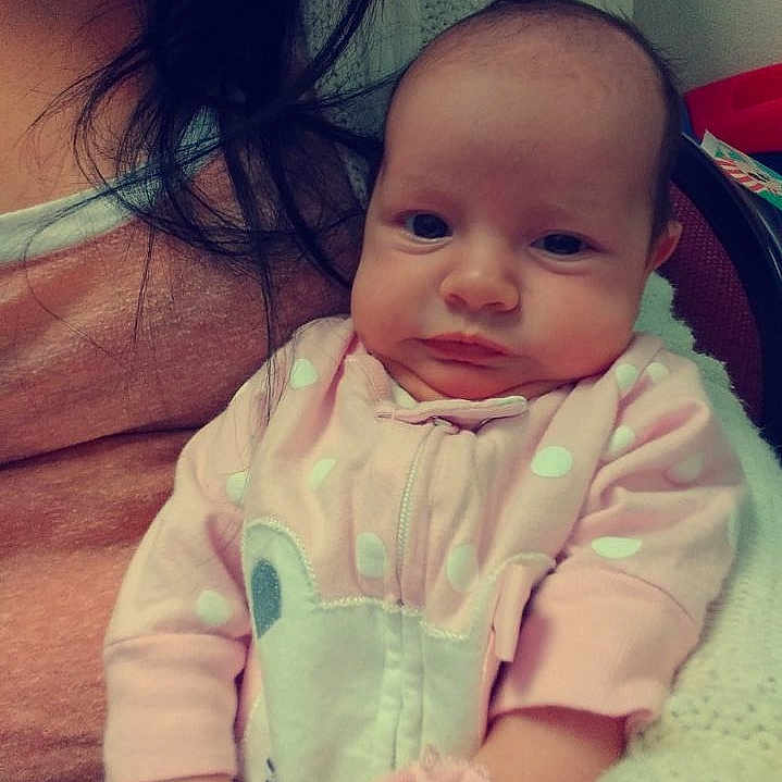 Iliana is registered to the contest to win money with this photo: baby, beauty, cheek, child, chin, cool, eye, eyebrow, face, facial_expression, forehead, hair, head, iris, lip, nose, person, pink, skin, smile