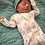 Roman joined the competition — help win amazing prizes! newborn, baby, sleeping, pajamas, hat, blanket, quilted, cozy, infant, cute, peaceful, child, portrait, resting, soft, green, white, patterned, indoor, young