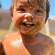 Damian joined the competition — help win amazing prizes! child, toddler, mud, dirty, smiling, happy, outdoor, sunlight, face, skin, hair, teeth, play, summer, nature, closeup, portrait, messy, barechested, fun