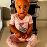 toddler, child, indoor, kitchen, countertop, headband, pink_clothing, socks, cute, portrait, baby, person, sitting, expression, face, large_eyes, cabinet, appliance, text_overlay, day_of_week