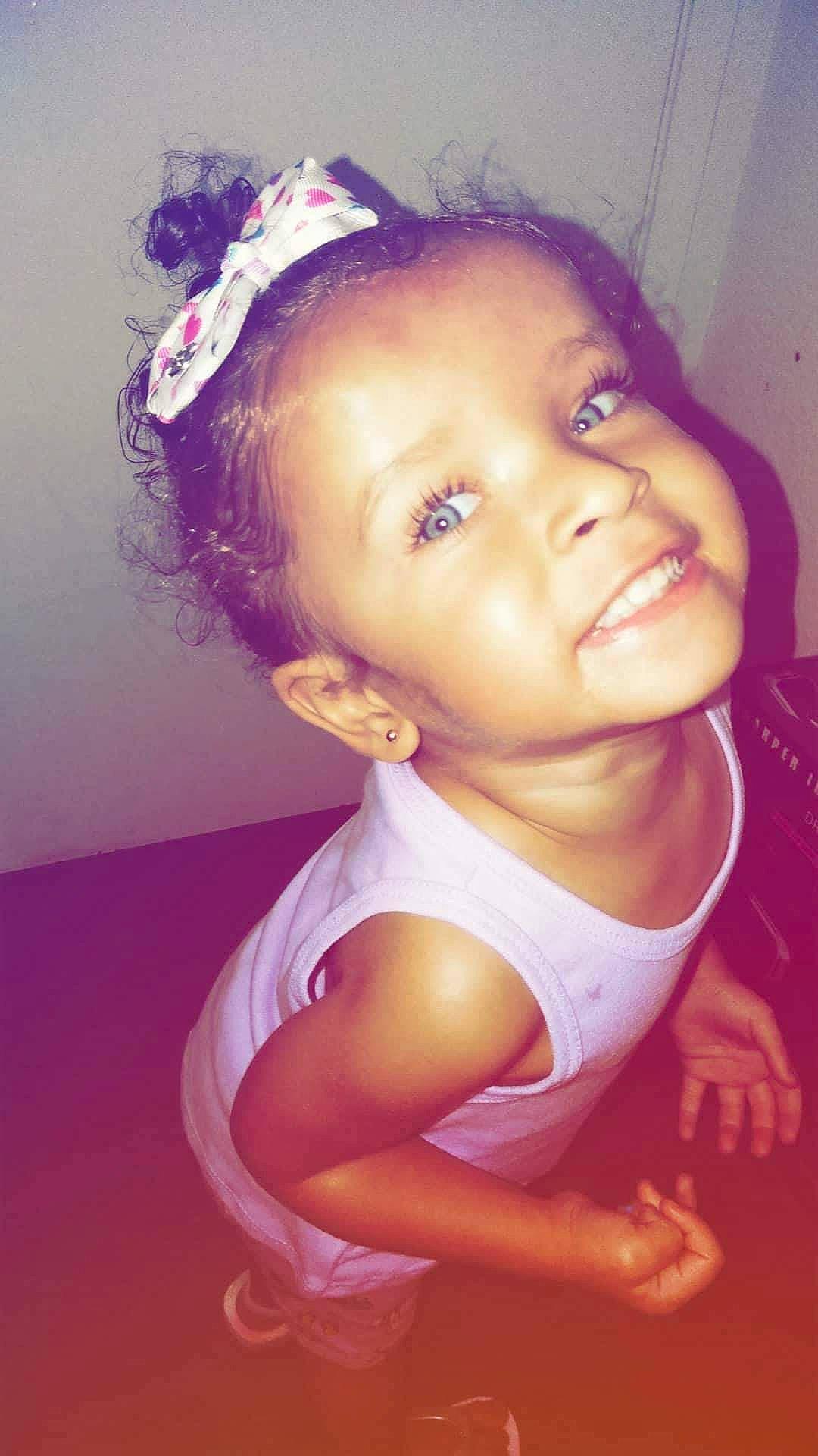 Jessica is registered to the contest to win money with this photo: baby, beauty, black_hair, cheek, child, child_model, ear, eyebrow, face, forehead, hair, hair_accessory, head, headband, joy, lip, nose, person, pink, skin