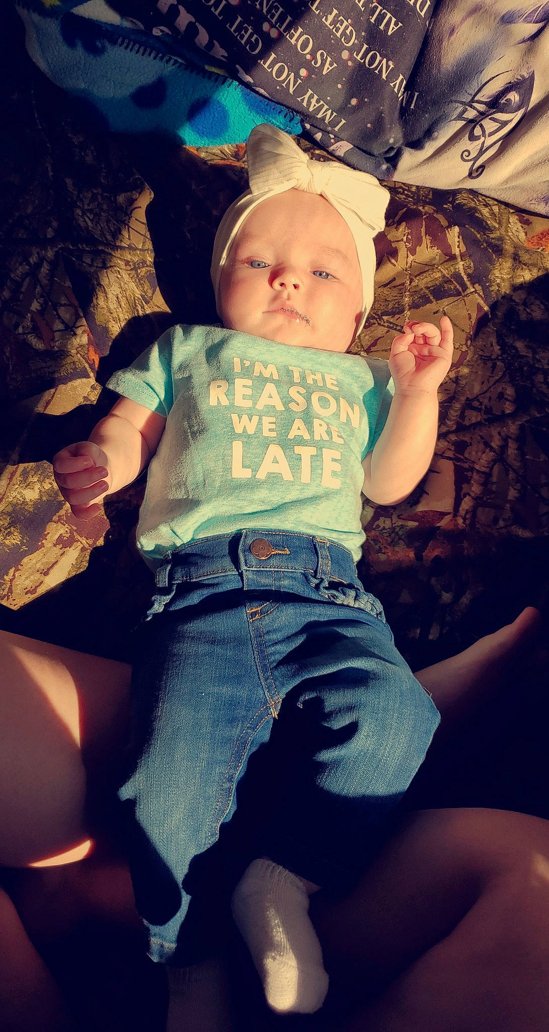 Rayven is registered to the contest to win money with this photo: abdomen, baby, cheek, child, cloud, cool, fun, hand, happy, leg, person, photography, play, sitting, smile, t_shirt, toddler, tree, trunk, vacation