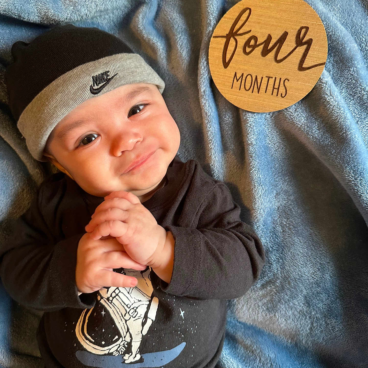 Orion is registered to the contest to win money with this photo: baby, baseballcap, beanie, bodypart, bonnet, cap, clothing, face, finger, hand, happy, hat, head, knitwear, pants, person, photography, portrait, smile, t_shirt