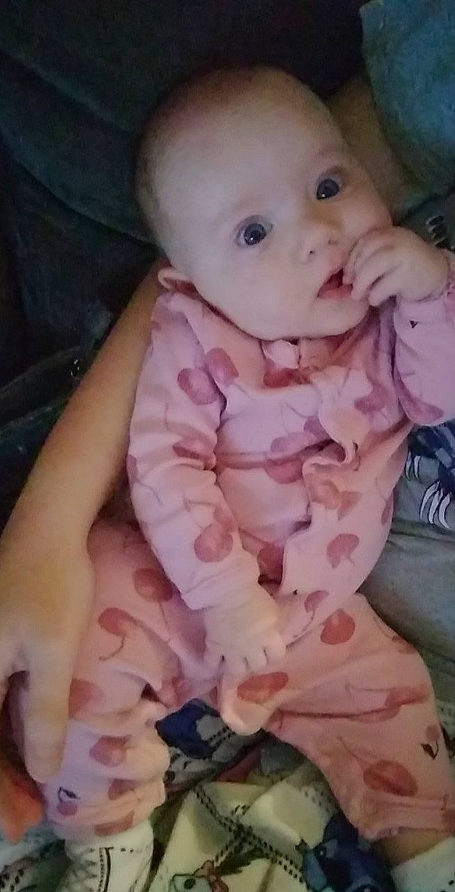 Ember joined the competition — help win amazing prizes! arm, baby_toddler_clothing, cheek, chin, comfort, eye, eyebrow, face, hand, head, human_body, iris, leg, lip, mouth, neck, nose, person, skin, sleeve