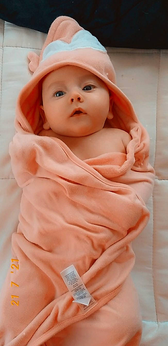Ember joined the competition — help win amazing prizes! baby, baby_toddler_clothing, beauty, cap, cheek, chin, eyebrow, face, happy, headgear, headwear, lip, nose, orange, person, pink, skin, sleeve, smile, stomach