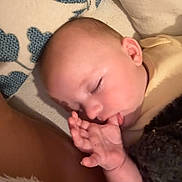 Theo is registered to the contest to win money with this photo: baby, sleeping, thumb_sucking, blanket, cozy, infant, child, resting, face, hand, closeup, indoors, cute, soft_lighting, peaceful, comfort, youth, portrait, skin, sleep