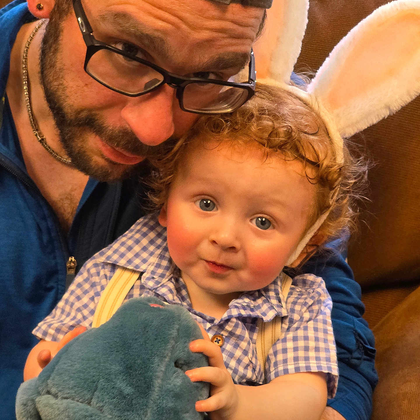 Patrick Jr is registered to the contest to win money with this photo: accessories, baby, bodypart, clothing, couch, cushion, face, finger, furniture, glasses, hand, head, homedecor, jewelry, necklace, pants, person, photography, portrait, toy