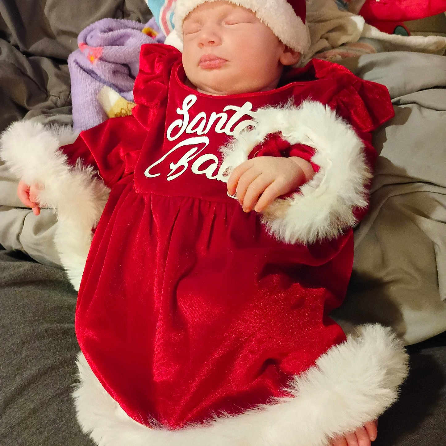 Anne-Marie joined the competition — help win amazing prizes! baby, blanket, bodypart, bonnet, cap, clothing, couch, face, finger, furniture, glove, hand, hat, head, hood, newborn, person, photography, portrait, sleeping