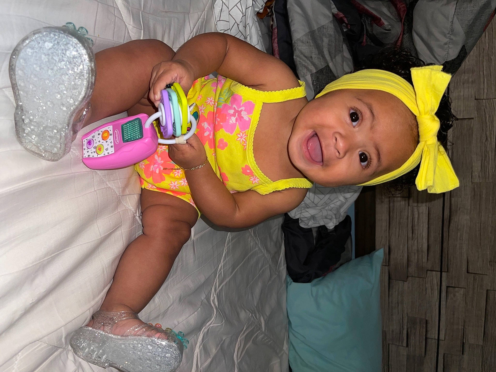 Selena Grace is registered to the contest to win money with this photo: abdomen, baby, baby_toddler_clothing, chest, dress, event, fun, happy, hat, headgear, human_leg, mouth, person, pink, sandal, smile, sun_hat, thigh, toddler, trunk