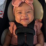 Soliana joined the competition — help win amazing prizes! baby, infant, smile, headband, pink, blanket, car_seat, child, happy, cute, face, clothing, ribbons, seatbelt, portrait, indoors, person, baby_girl, adorable, infant_girl