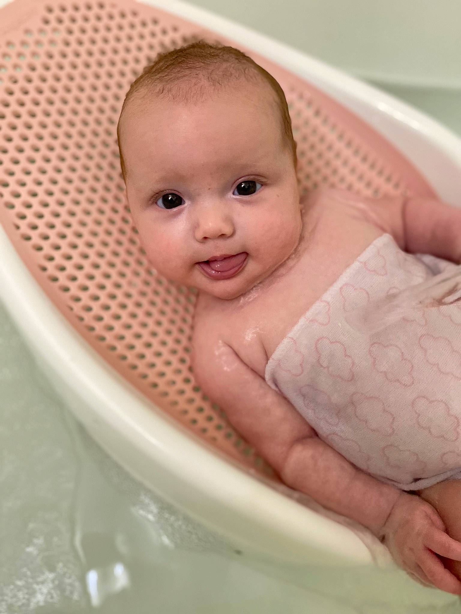 Isla joined the competition — help win amazing prizes! baby, baby_bathing, bathing, bathroom, bathtub, cheek, comfort, eye, eyebrow, facial_expression, fluid, hand, iris, lip, person, plumbing_fixture, product, skin, smile, stomach