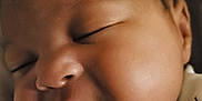Bella is registered to the contest to win money with this photo: baby, bodypart, face, finger, hand, head, mouth, newborn, person, photography, portrait, sleeping