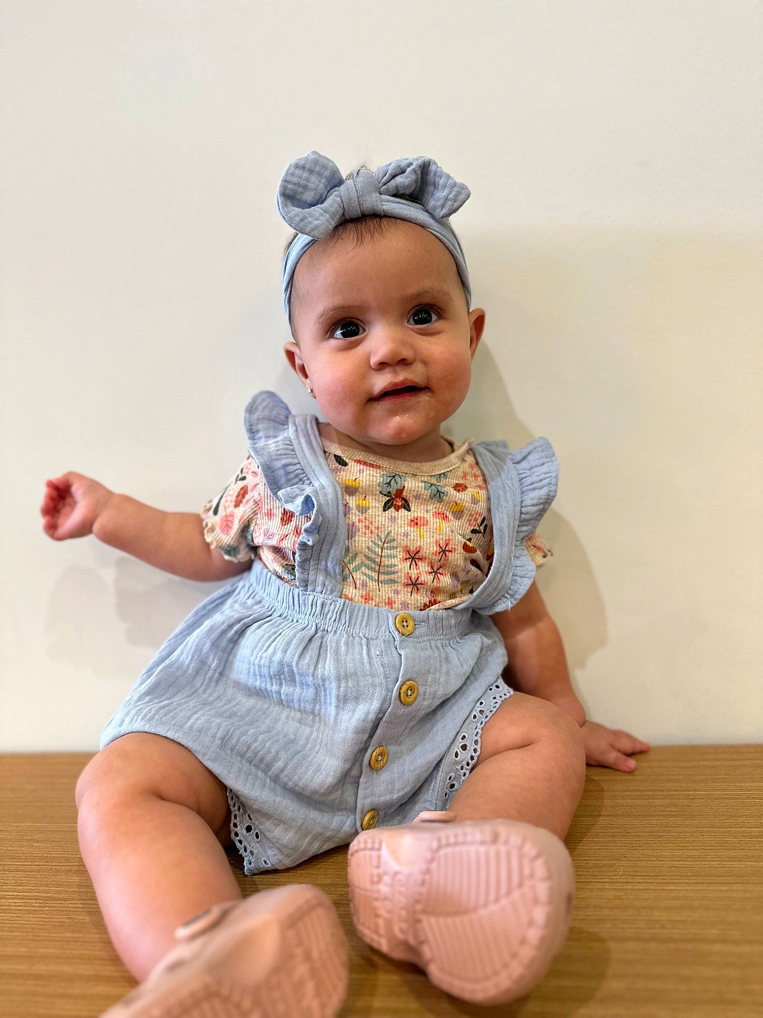 Sofia joined the competition — help win amazing prizes! baby, baby_toddler_clothing, cheek, child, comfort, eye, fashion_accessory, flooring, foot, headband, headgear, human_leg, iris, knee, person, sitting, skin, sleeve, thigh, toddler