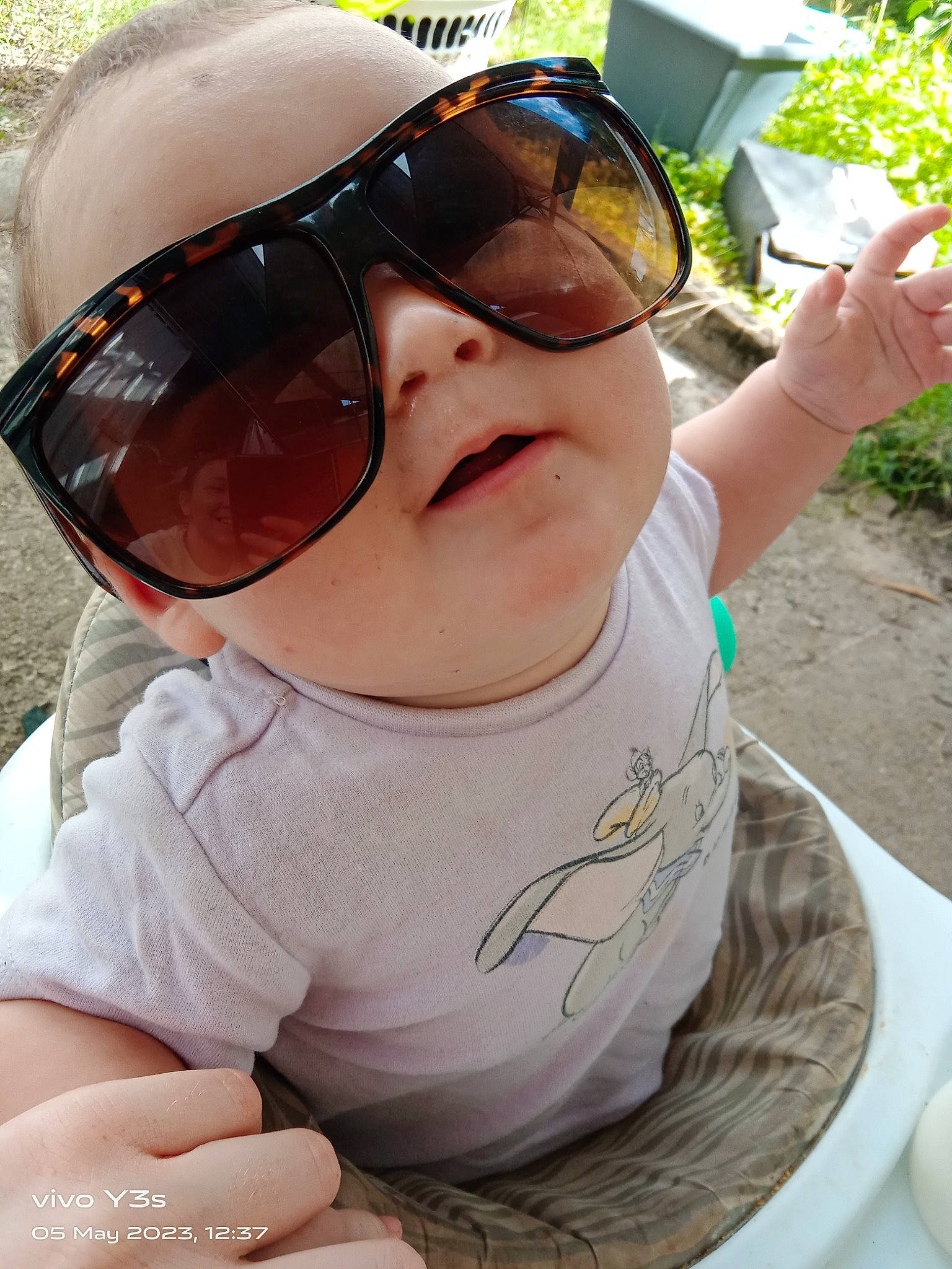 Eliza joined the competition — help win amazing prizes! baby, baby_toddler_clothing, eye_glass_accessory, eyewear, fun, glasses, goggles, grass, happy, headgear, leisure, person, personal_protective_equipment, plant, recreation, sleeve, sunglasses, toddler, tree, vision_care
