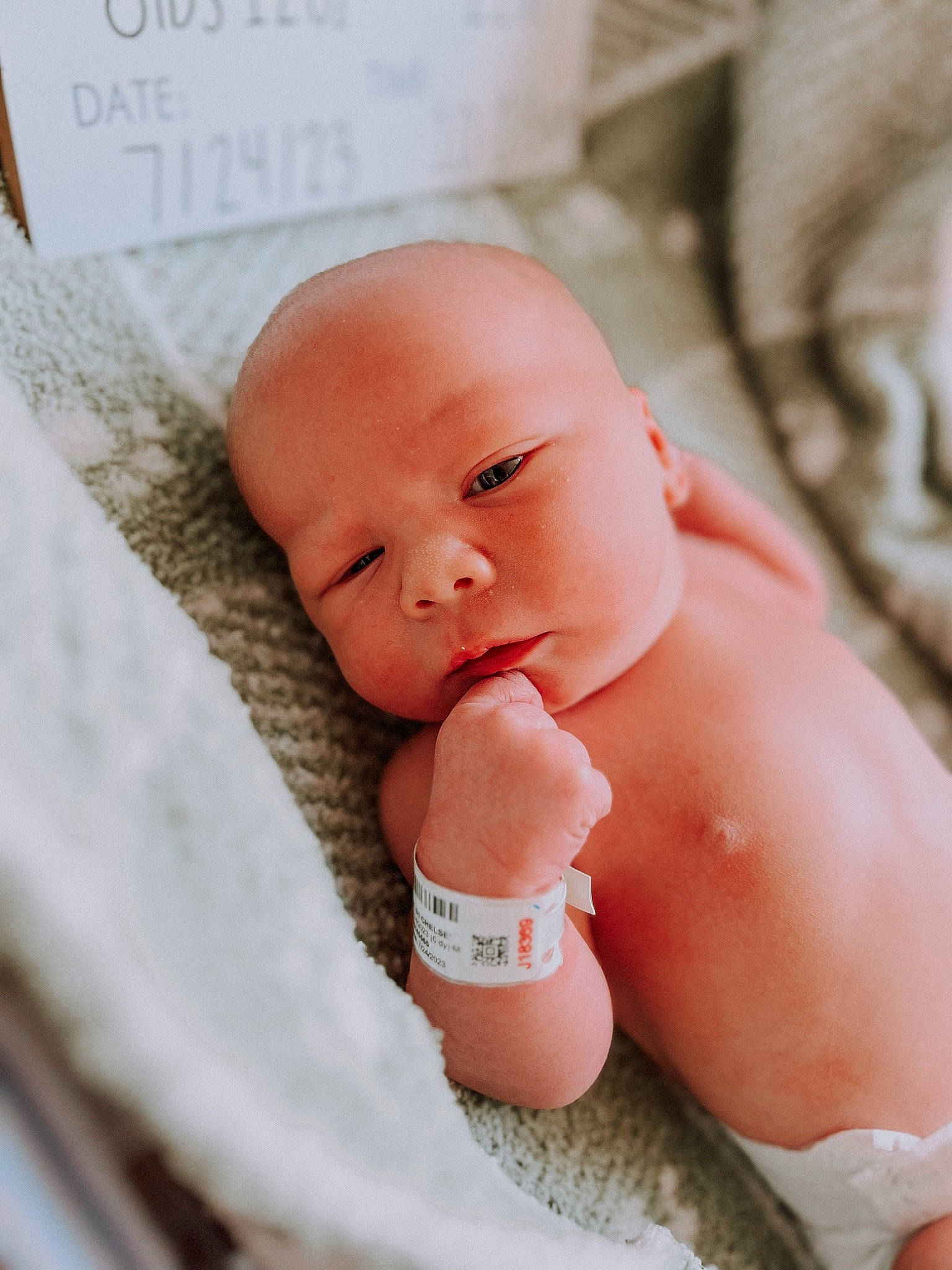 Bennett is registered to the contest to win money with this photo: arm, baby, baby_sleeping, baby_toddler_clothing, cheek, chin, comfort, eye, facial_expression, finger, gesture, hand, happy, head, human_body, mouth, nose, person, skin, stomach