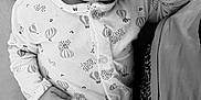 Rafael a rejoint le concours — aidez-le/la à gagner de superbes lots ! baby, newborn, sleeping, onesie, knitted_socks, infant, hand, face, cute, resting, soft, cozy, patterned_clothing, portrait, black_and_white, peaceful, closeup, person, child, indoors