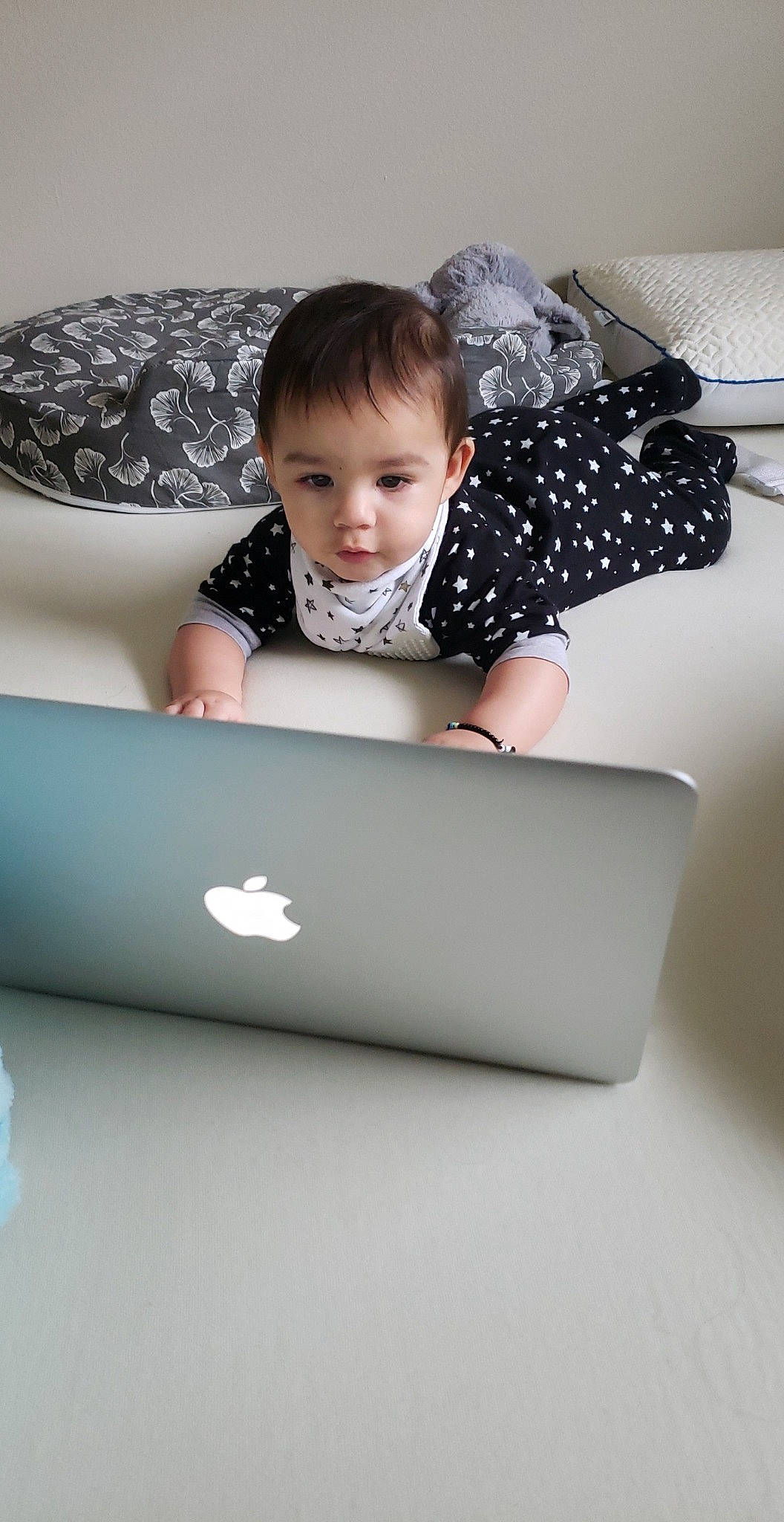 Isa is registered to the contest to win money with this photo: child, electronic_device, material_property, person, technology, toddler