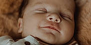 Rafaël participe au concours pour gagner de l'argent avec cette photo : apparel, baby, blanket, button, child, closeup, cozy, cute, face, head, indoors, infant, newborn, peaceful, portrait, relaxation, skin, sleeping, smile, soft_texture