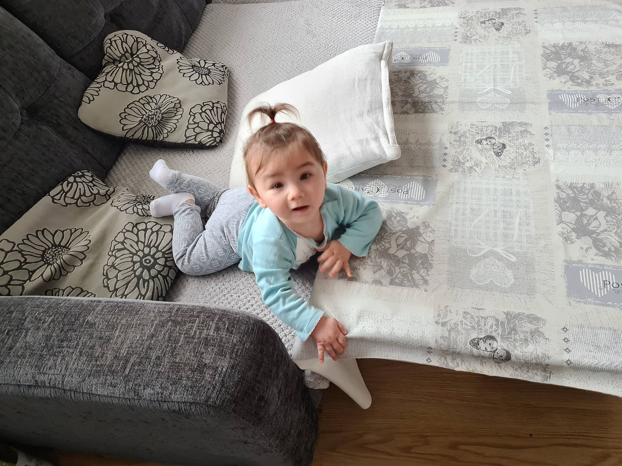 Elisa joined the competition — help win amazing prizes! baby, baby_toddler_clothing, bedding, comfort, couch, cushion, floor, flooring, home_accessories, linens, living_room, pattern, person, pillow, quilt, room, textile, throw_pillow, wood_flooring
