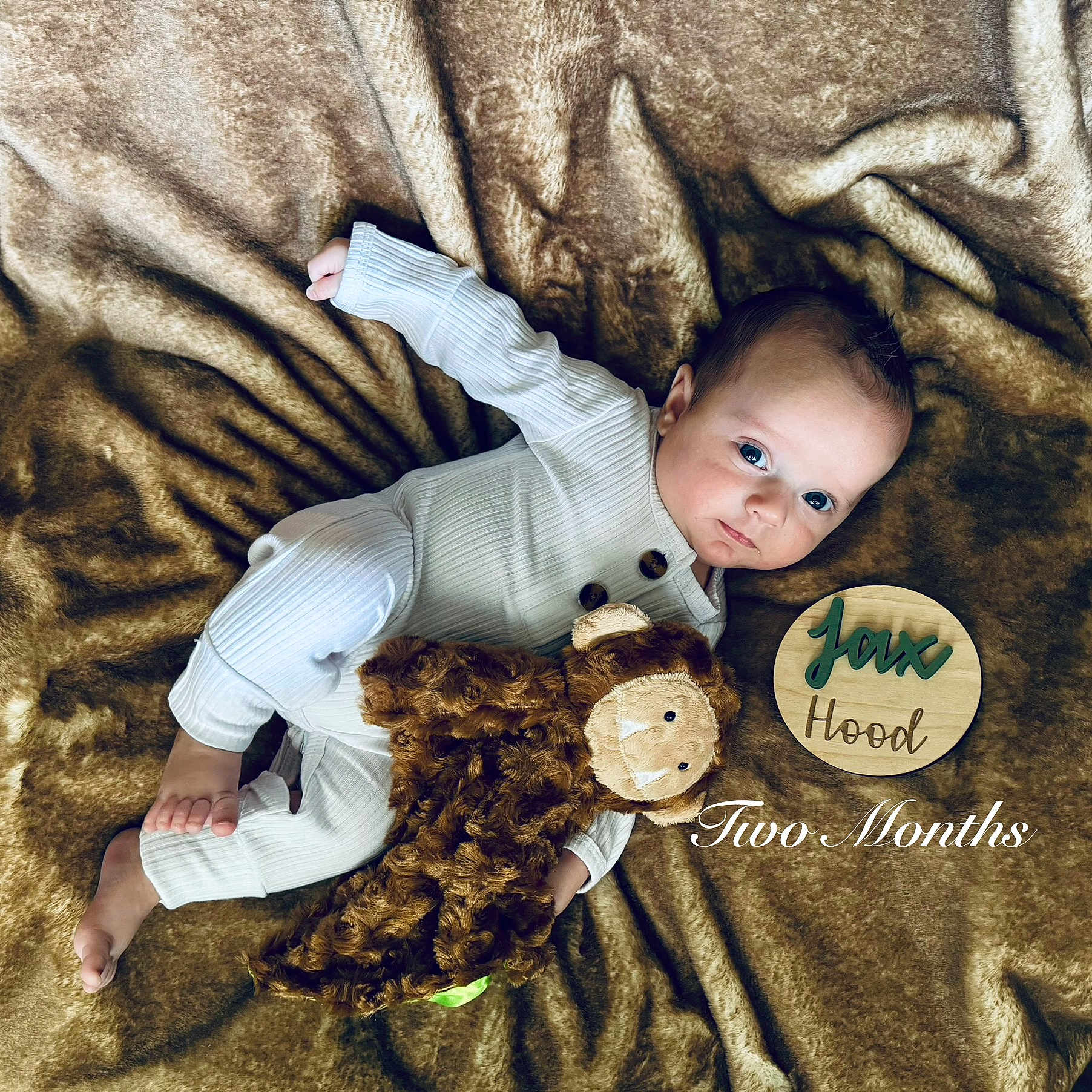 Jax is registered to the contest to win money with this photo: baby, bed, blanket, clothing, couch, crawling, cushion, face, furniture, head, homedecor, linen, newborn, pants, person, photography, plush, portrait, quilt, toy