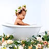 baby, bathtub, child, cute, decor, floral_arrangement, flower_crown, flowers, greenery, infant, nature, peaceful, pink_flowers, portrait, side_view, skin, studio_shot, water, white_background, white_flowers