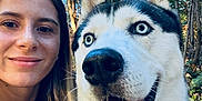 Max a rejoint le concours — aidez-le/la à gagner de superbes lots ! woman, dog, siberian_husky, pet, leash, smile, outdoor, forest, trees, tongue_out, collar, happy, person, nature, close_up, daylight, animal, friendship, portrait, canine