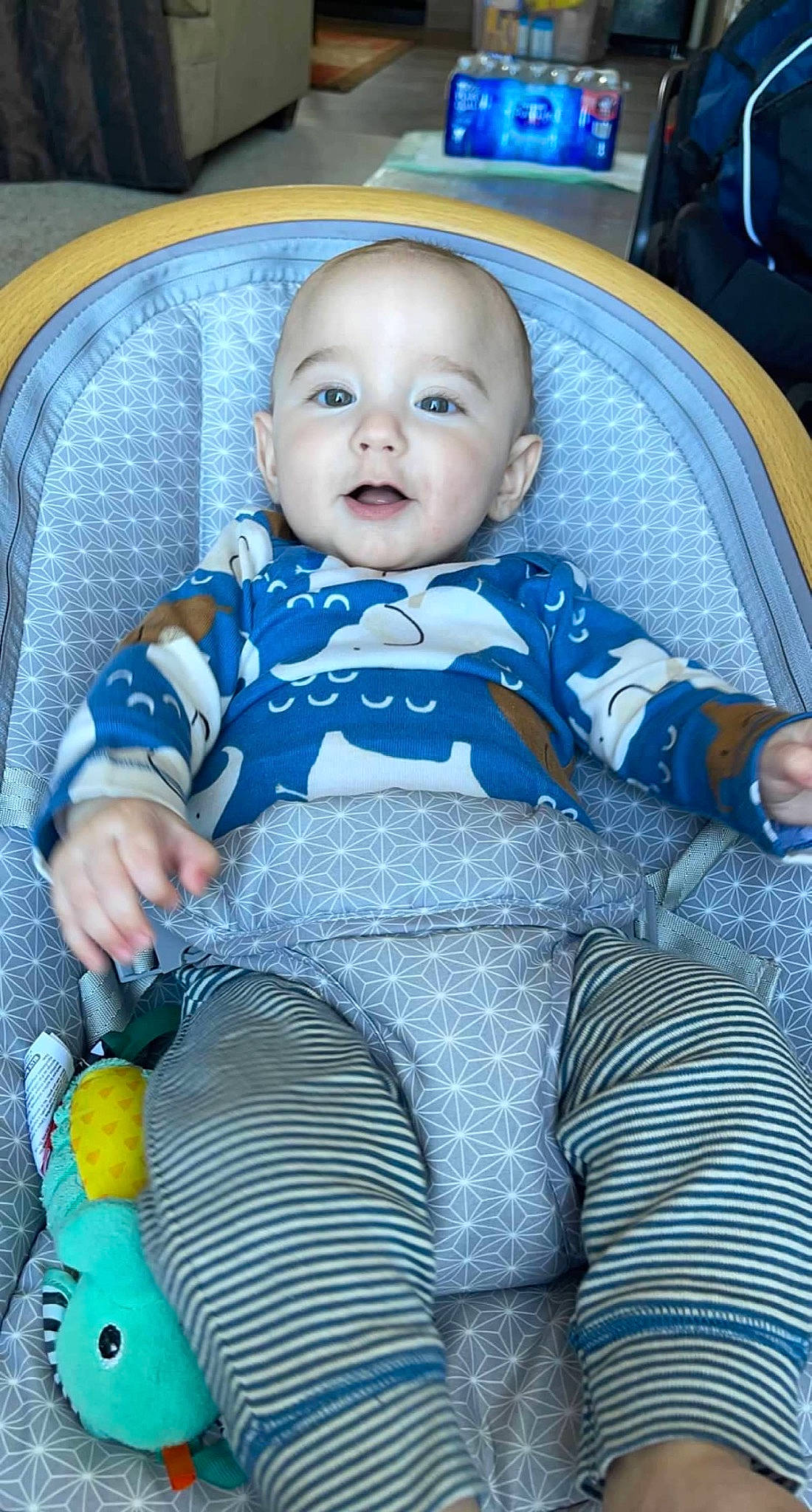 Dallas is registered to the contest to win money with this photo: azure, baby, baby_toddler_clothing, black, blue, car_seat, chair, cheek, child, comfort, electric_blue, eye, linens, person, product, purple, sitting, skin, sleeve, smile