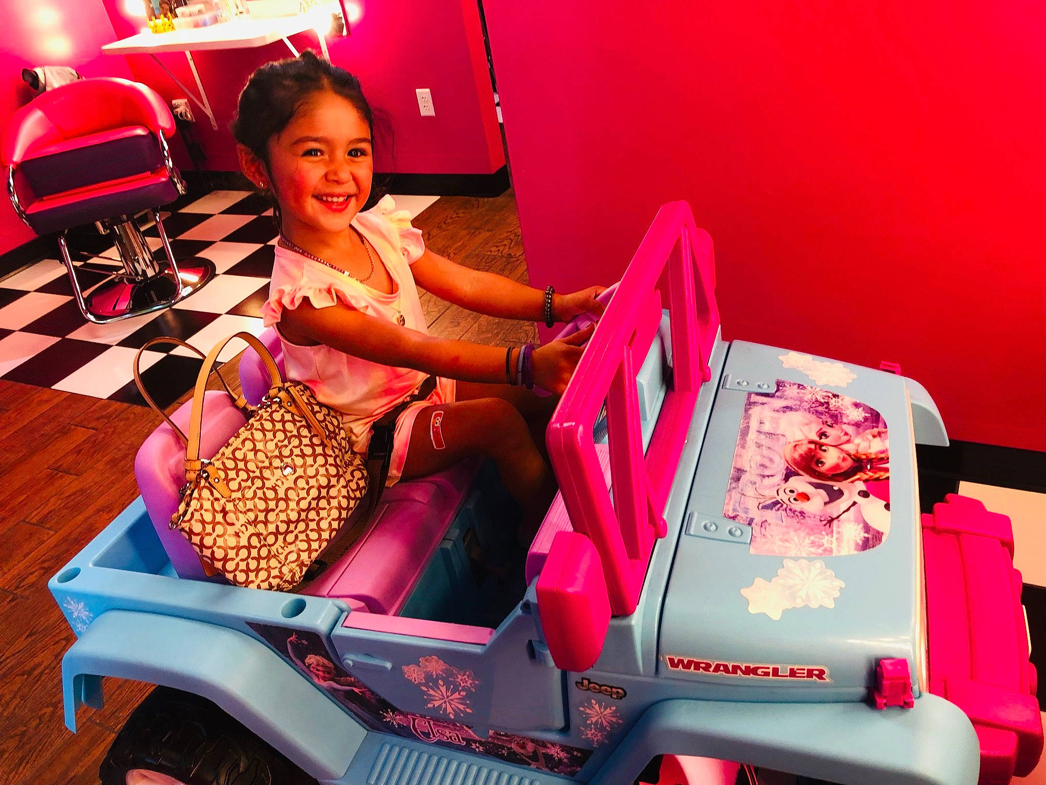 Brianna is registered to the contest to win money with this photo: audio_equipment, automotive_design, cuisine, entertainment, event, fun, joy, leisure, machine, magenta, motor_vehicle, office_supplies, person, pink, recreation, smile, snack, sweetness, vehicle, wheel