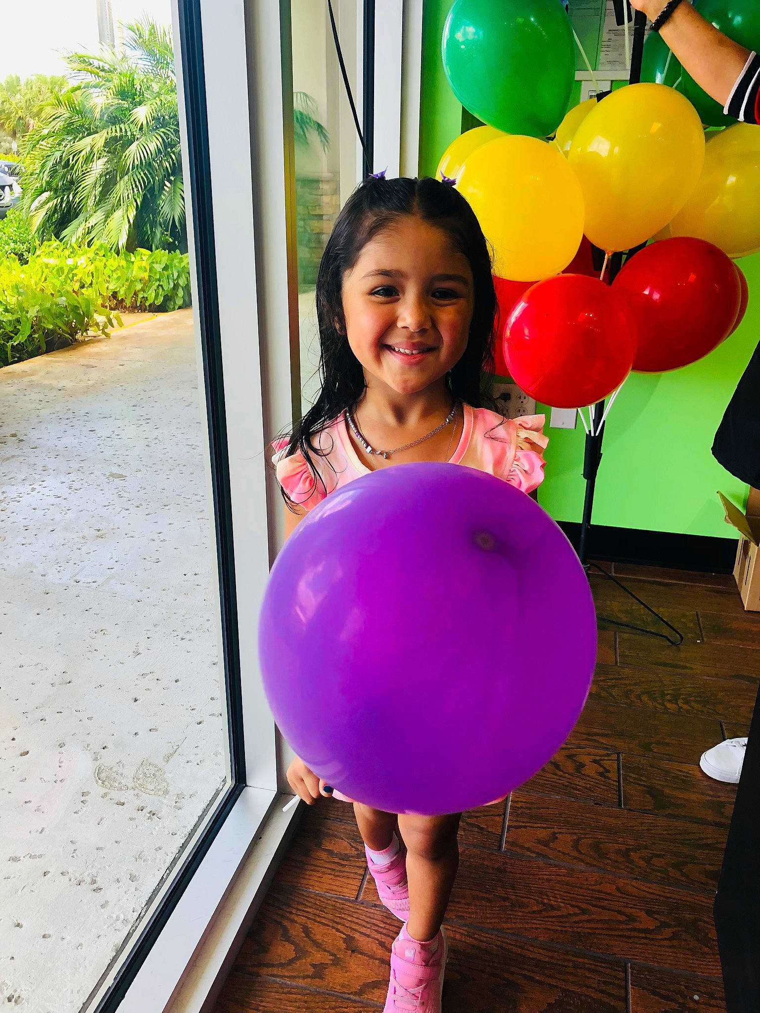 Brianna is registered to the contest to win money with this photo: balloon, child, electric_blue, event, formal_wear, fun, happy, joy, leisure, magenta, party, party_supply, person, photograph, pink, plant, purple, recreation, smile, snapshot