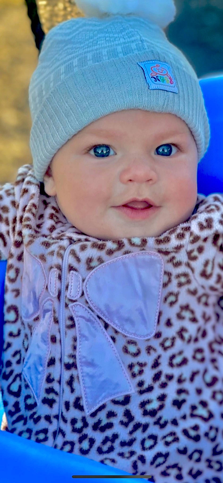 Karsyn joined the competition — help win amazing prizes! baby, baby_toddler_clothing, blue, cap, cheek, eye, face, facial_expression, happy, head, headgear, headwear, iris, lip, outerwear, person, photograph, pink, skin, sleeve
