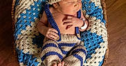 Sebastian joined the competition — help win amazing prizes! art, baby, baby_products, bonnet, cap, child, craft, crochet, hat, headgear, knitting, product, textile, toddler, wood, wool
