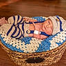 Sebastian is registered to the contest to win money with this photo: art, baby, baby_products, basket, child, crochet, home_accessories, knitting, product, wicker, wool