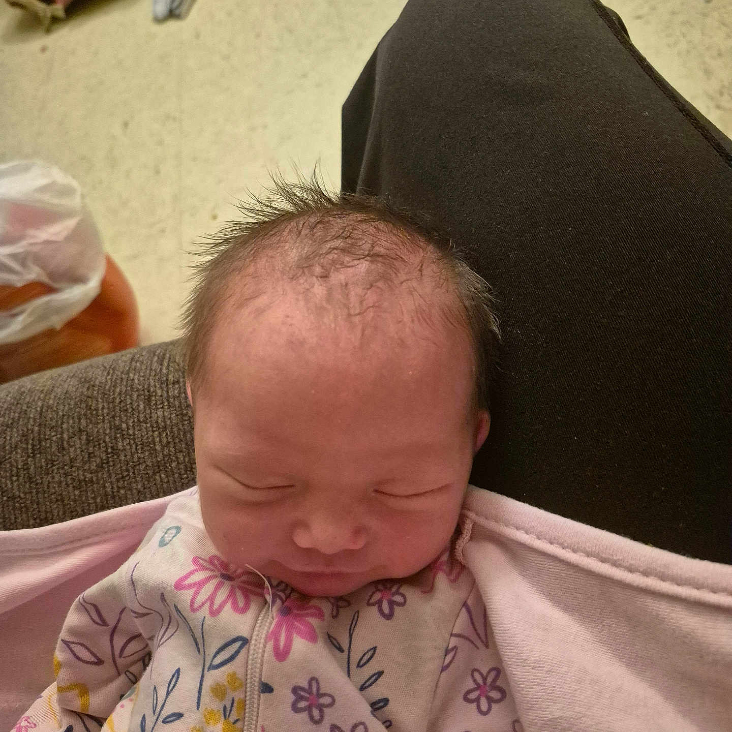 Katana joined the competition — help win amazing prizes! baby, bag, casual, clothing, couch, cozy, face, floor, floral_pattern, hair, head, indoor, lap, newborn, onesie, person, relaxed, rest, sleeping, soft_lighting