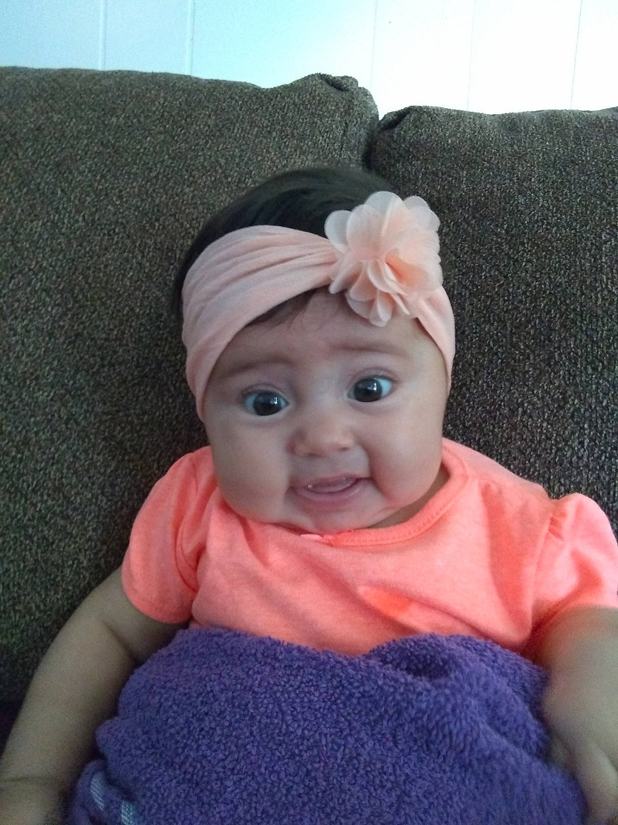 Lorraine joined the competition — help win amazing prizes! baby, cheek, child, ear, face, forehead, hair_accessory, head, headgear, headwear, linens, nose, person, pink, skin, textile, toddler