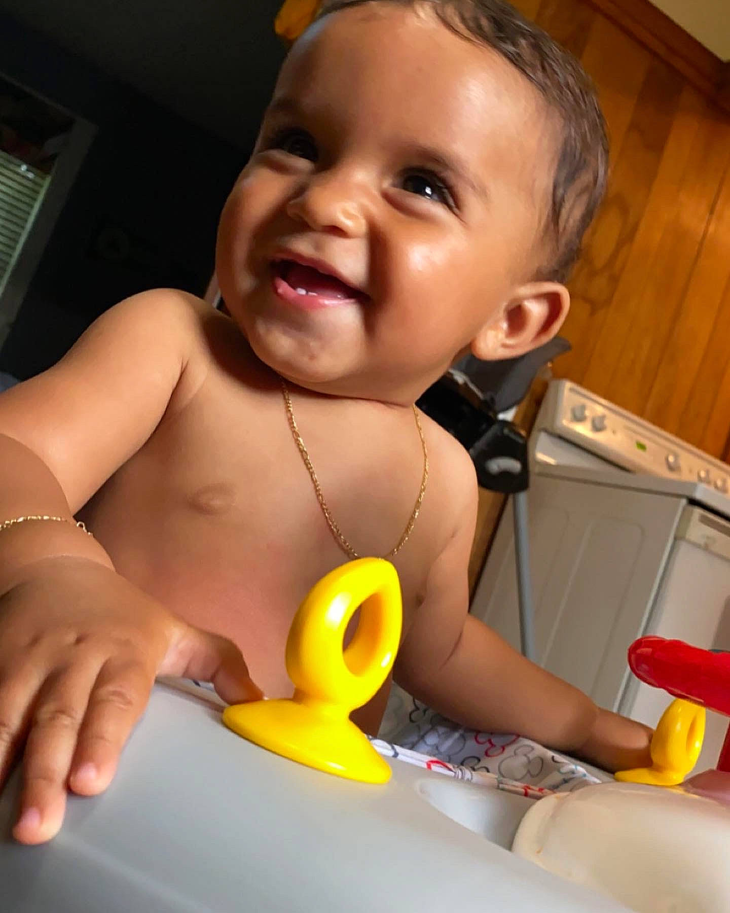 Benjamin is registered to the contest to win money with this photo: arm, baby, baby_playing_with_toys, cheek, eye, eyebrow, eyelash, face, facial_expression, happy, head, iris, lip, mouth, neck, nose, person, product, skin, smile