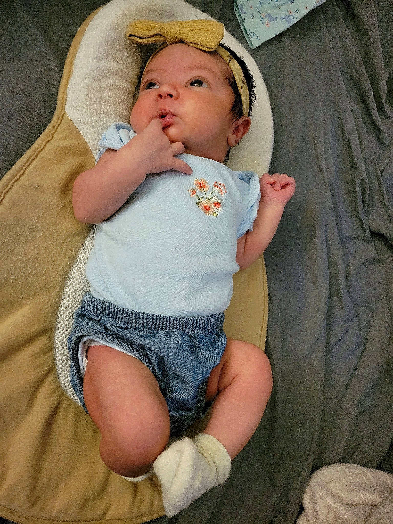 Eliza joined the competition — help win amazing prizes! baby, baby_products, baby_sleeping, baby_toddler_clothing, cheek, child, comfort, eye, face, finger, head, human_leg, knee, linens, person, sitting, skin, sleeve, textile, thigh