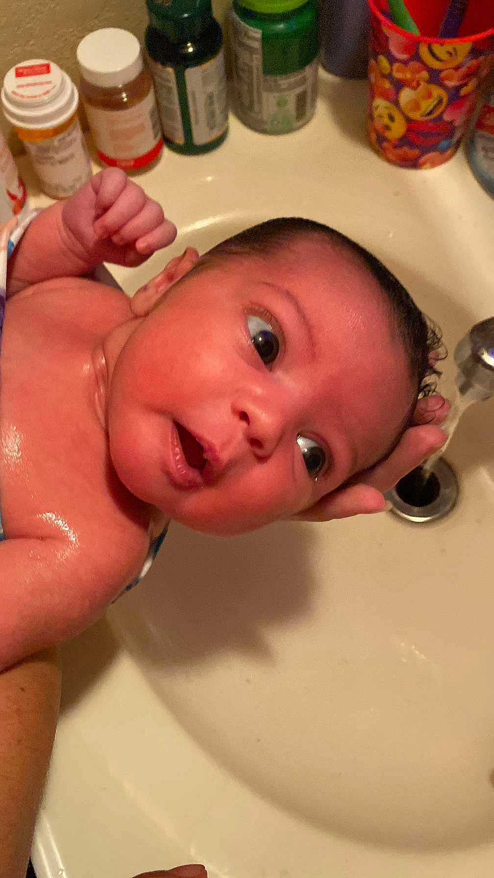 Eliza is registered to the contest to win money with this photo: baby_bathing, bathing, cheek, chest, chin, ear, eye, eyebrow, eyelash, face, finger, fluid, forehead, head, lip, mouth, neck, nose, person, skin
