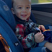 Jaydon joined the competition — help win amazing prizes! baby, car_seat, casual, child, clothing, daylight, face, happy, head, person, plaid_shirt, safety, seatbelt, sitting, smiling, toddler, transportation, vehicle_interior, window, young_child